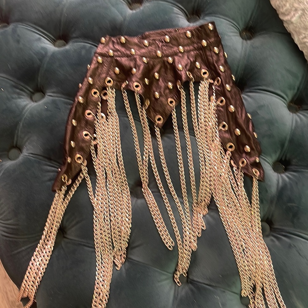Chain and stud adorned decorative collar. 100% leather. Smoke free home.